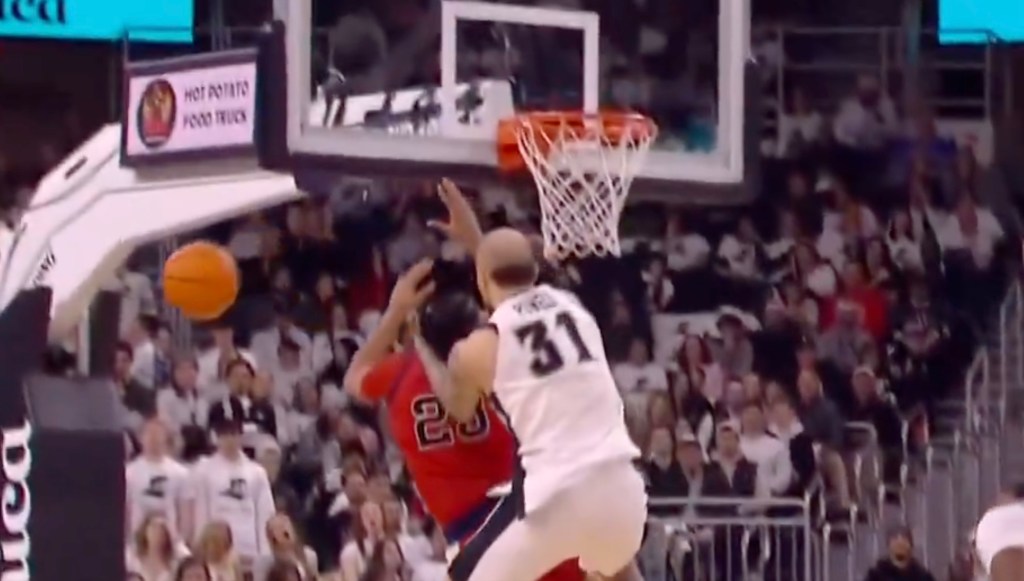 Powell committing the hard foul on Hopkins just before chaos broke out.